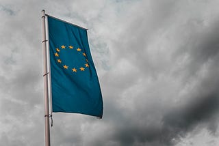 European Union flag hanging from a pole