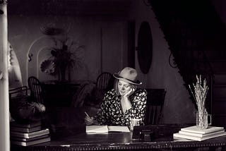 Women writing.