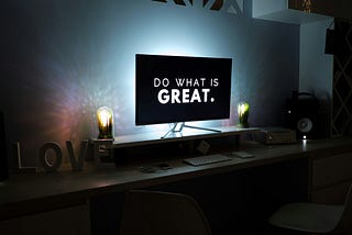 An image with the caption: do what is great.  Along with it are two light bulbs and a TV screen