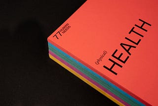 Front cover of an orange book with the word ‘Health’ on the cover