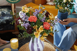 GIF from Bloom & Wild of flowers, with copy Miss you friend x