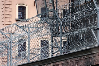 Expert Warns Of ‘Perilous’ Coronavirus Threat In Jails & Prisons [Podcast]