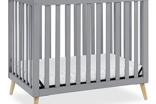 delta-children-essex-convertible-mini-baby-crib-with-2-75-inch-mattress-grey-with-natural-1