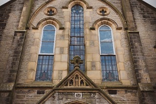 Stone front of a church building.