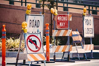 Street signs, representing wrong way.