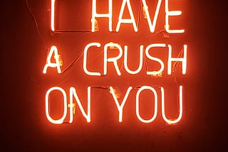 Neon letters that spell “I have a crush on you”