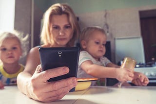 A mom trying to juggle between many things while working.