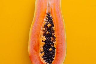 Longitudinal cut papaya.