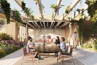 A rendering shows people gathered at a table in an inviting outdoor space with lots of greenery.