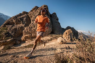 A runner on a mountain trail.