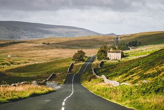 A road going through the English countryside