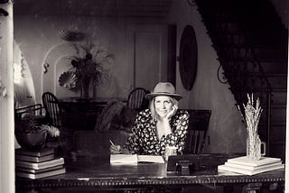 Writer at desk, developing a story.