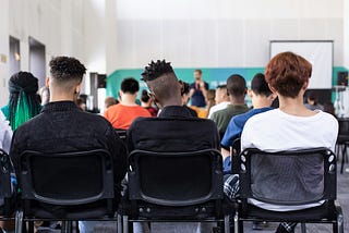 students sitting in classroom