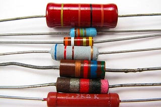 Resistors in a stack. Our blog answers the question “do resistors have polarity?”