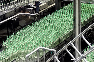 Bottles moving through an actual factory.