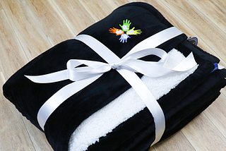 The Perfect Gift: Designing a Custom Throw Blanket with Logo for Loved Ones