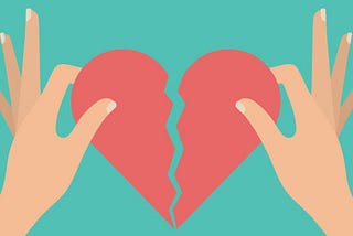 Two hands pulling a heart in half