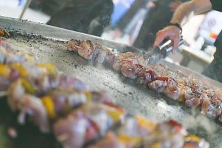 Meat skewers being cooked