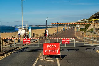 Road closure signs and barriers
