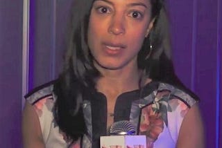 Image of Angela Rye as she speaks with NYC radio station WBLS at the 108th NAACP Convention, Baltimore, 2017.