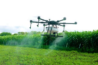 What are the current adoption trends for using drones in spray application in the US and worldwide?