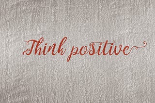 A motivational quote titled “Think Positive”