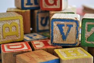 Colorful toy blocks with letters