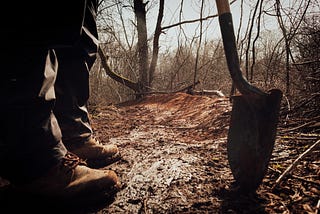 Man about to dig a hole