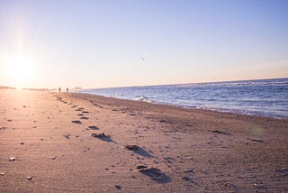 Footprints on a seashore