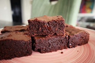 fudge brownies on pink plate