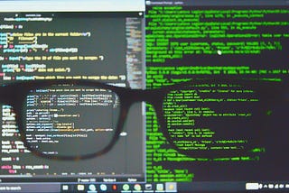 A software developer’s computer screen while programming. The left side shows an IDE and the right shows a terminal with glasses. These are used to create safe PDFs for virus testing in 2022.