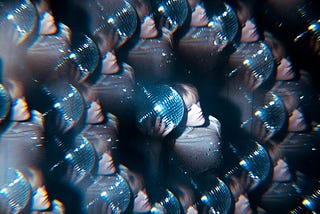 Kaleidoscopic image of a woman and a disco ball