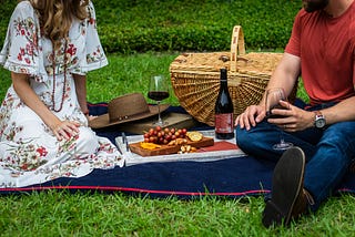 A couple enjoy a picnic