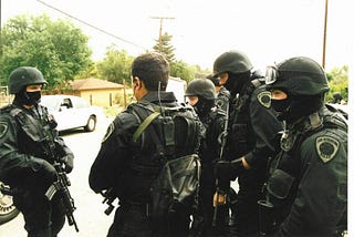 Take Those Masks Off (Not You, Protesters — You, Cops)