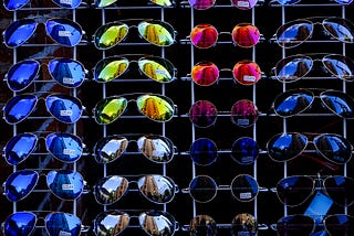 a collection of mirrored sunglasses