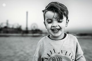 A young boy happy and smiling