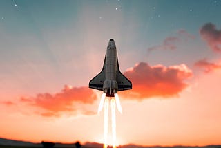 Space shuttle taking off