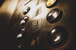 Close up photo of elevator push buttons