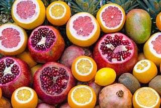 Colorful diced fruit including oranges, grapefruit, and pomegrante