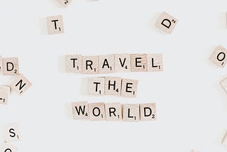 an image that says travel the world with wooden blocks