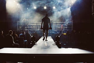 Boxer walking to the ring, dramatic, smoke-filled lighting