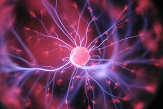 Abstract picture of a brain cell with neurons firing.