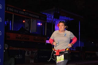 Me running, and crying my way to the finish line on the NYC Marathon