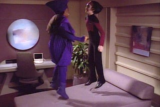 Star Trek The Next Generation Rascals. Young Guinan and Ro Laren jumping on a bed.