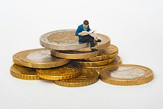 a pile of euro coins