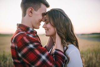 A man and a woman being loving