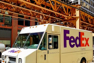 Fred, the Fedora-Wearing FedEx Frontliner