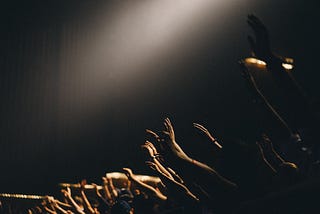 Crowd of hand raisers