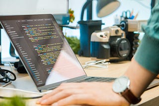 Person coding at their desk