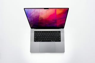 MacBook Pro on a white surface